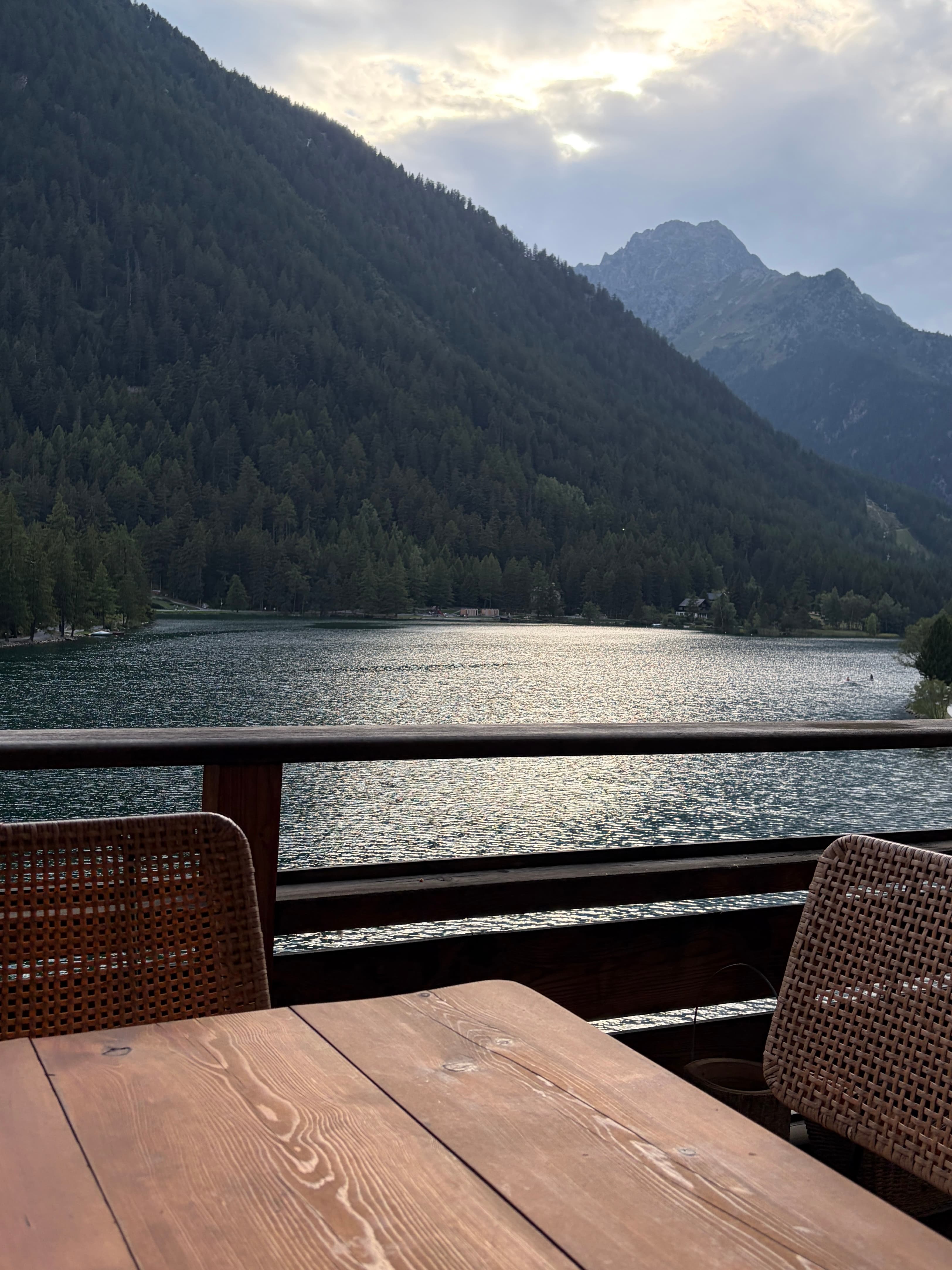 Lake-view balcony at The Alpine Nest, overlooking the still waters of Champex-Lac